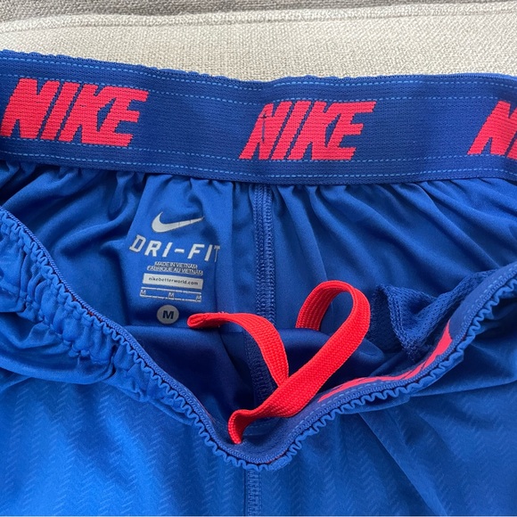 Nike Dri-fit basketball shorts.  Orange and Blue - Picture 2 of 3